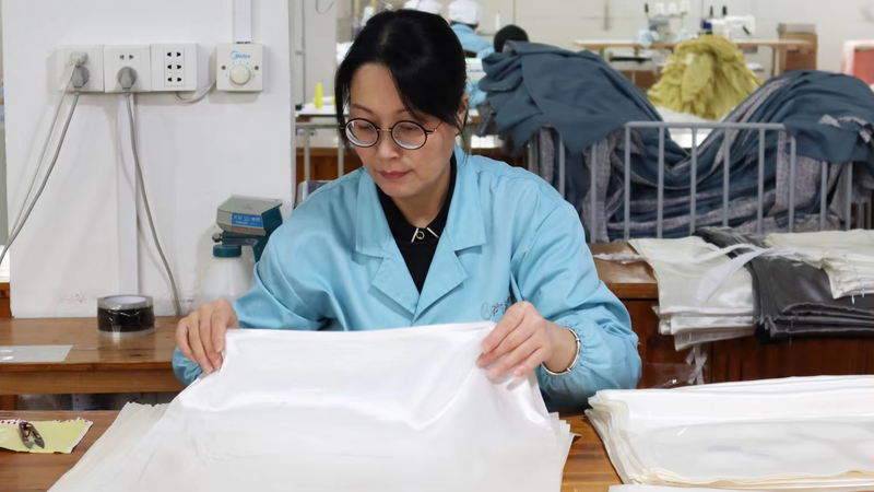 1.-silk-factory-picture-quality-checking.png