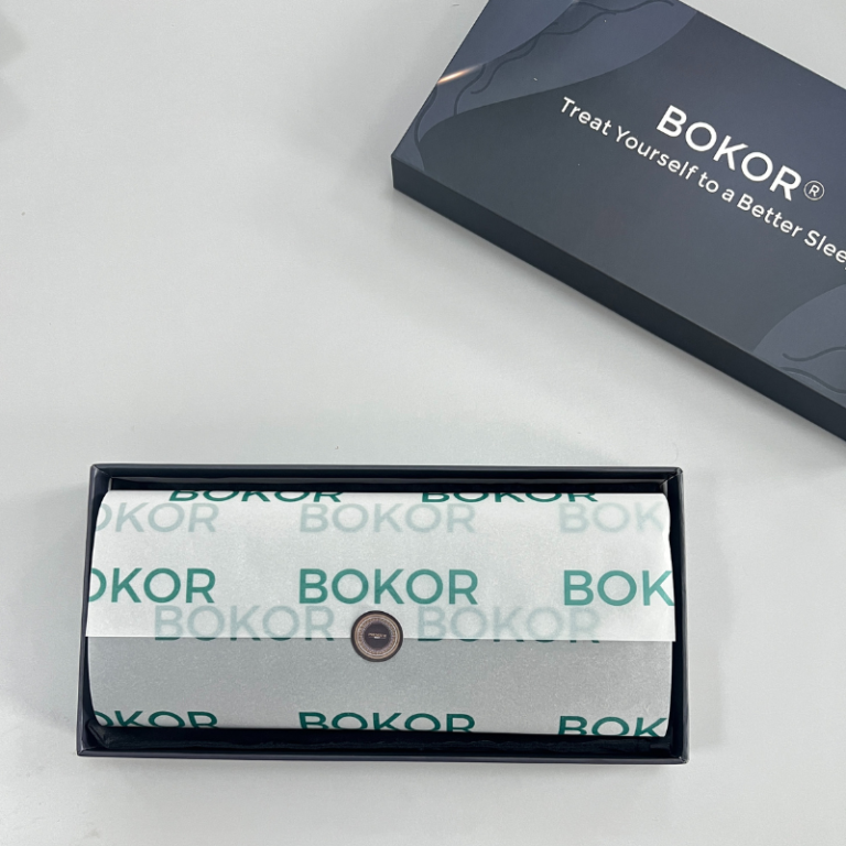 Color box with wrapped paper and sticker