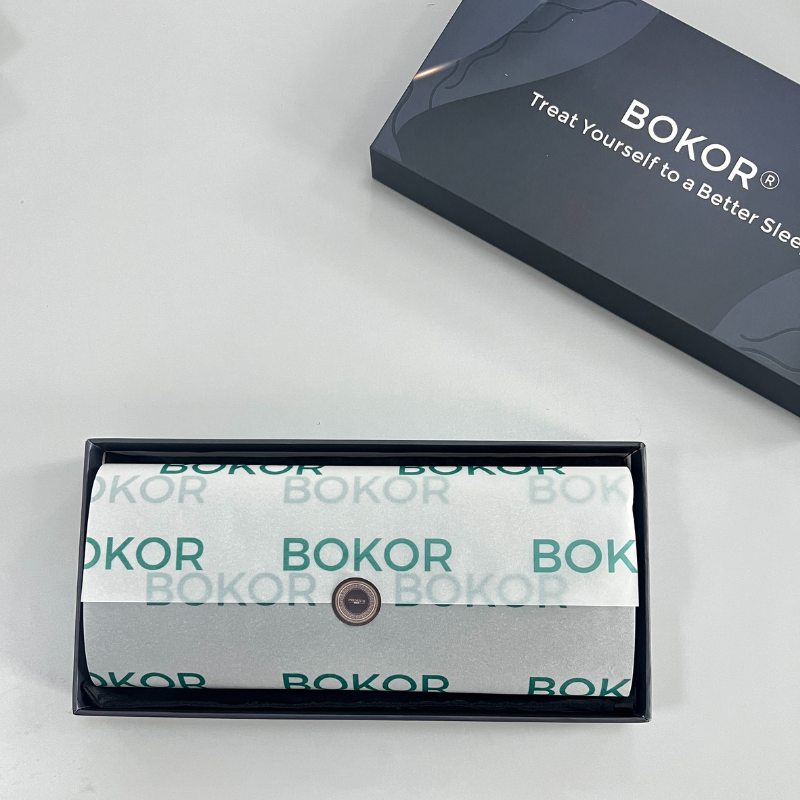 Color box with wrapped paper and sticker